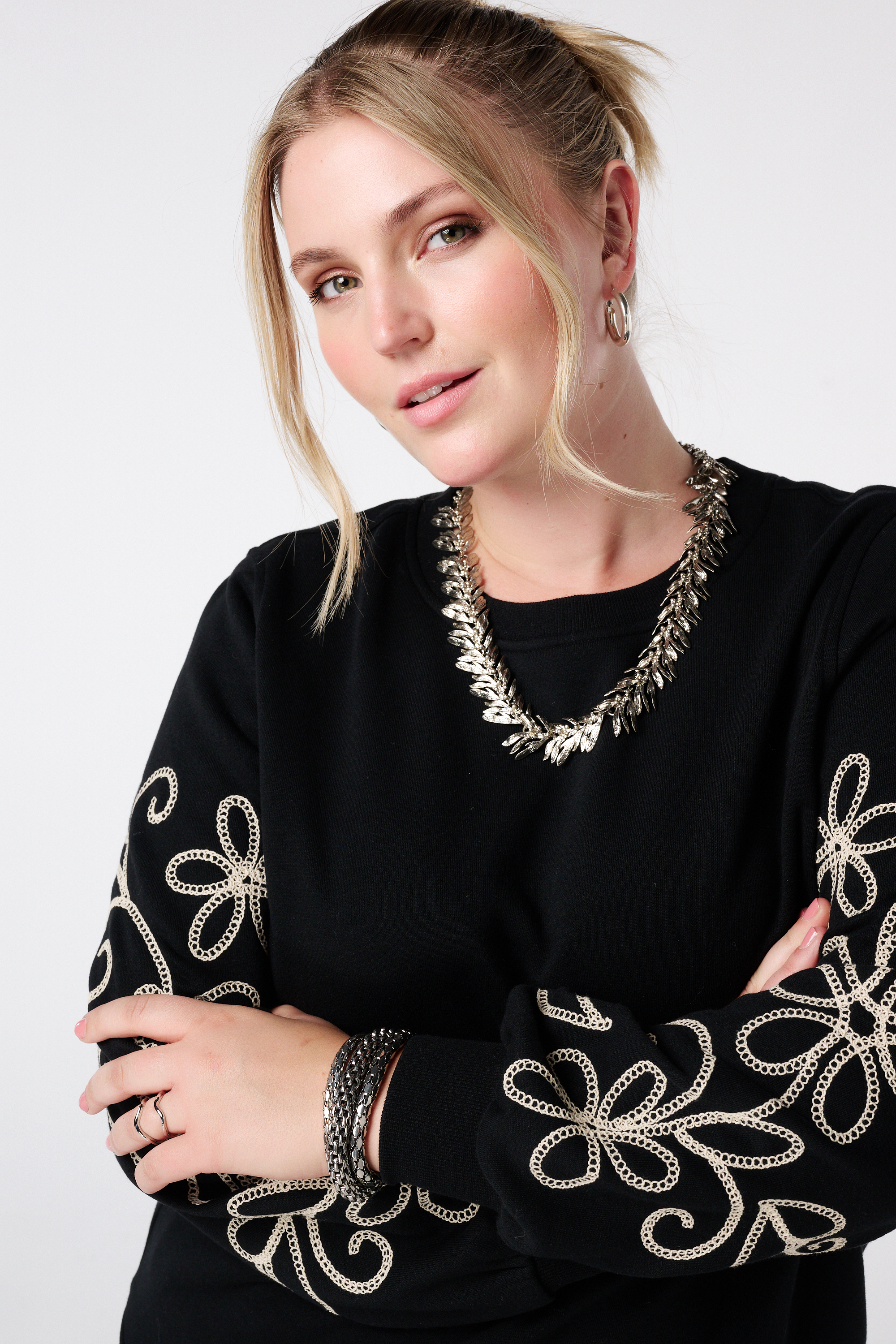 Sweater met broderie details Zwart