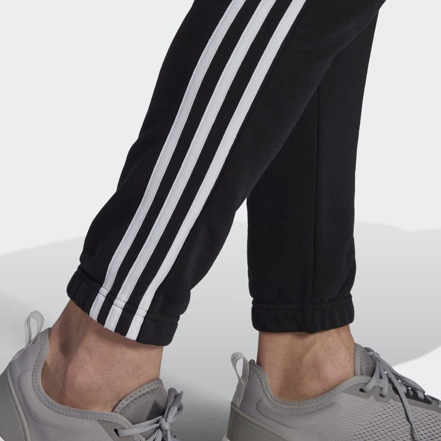 adidas Bas de Survêtement Essentials French Terry Tapered 3-Stripes - Noir/Blanc