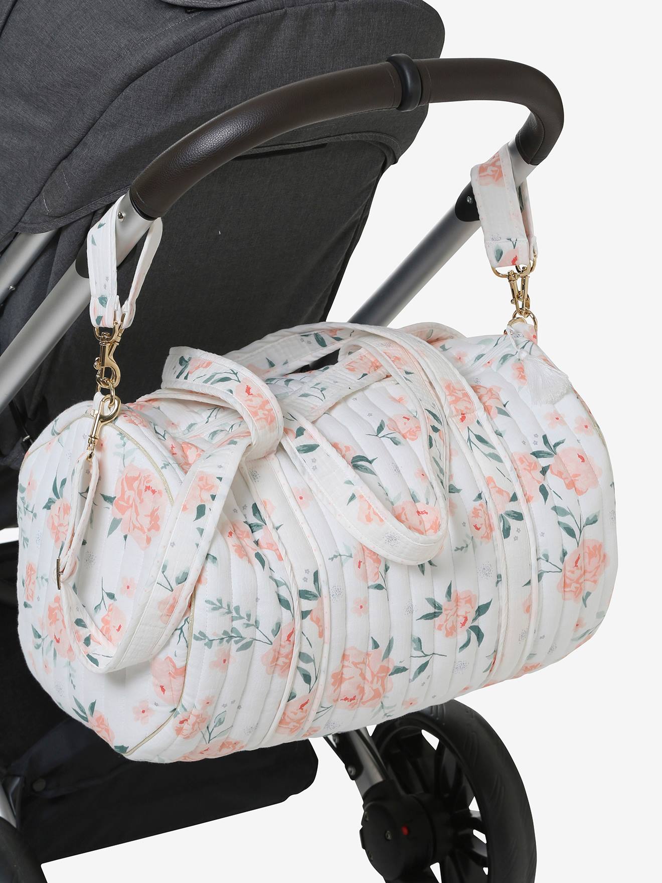 Bolsa de maternidade Baby Roll em gaze de algodão branca tamanho médio com estampa.