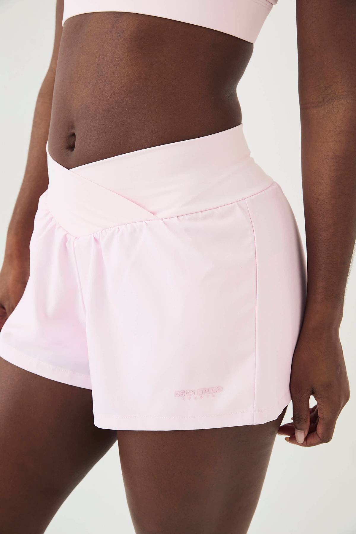 Short de Course DSGN Studio à Taille Portefeuille