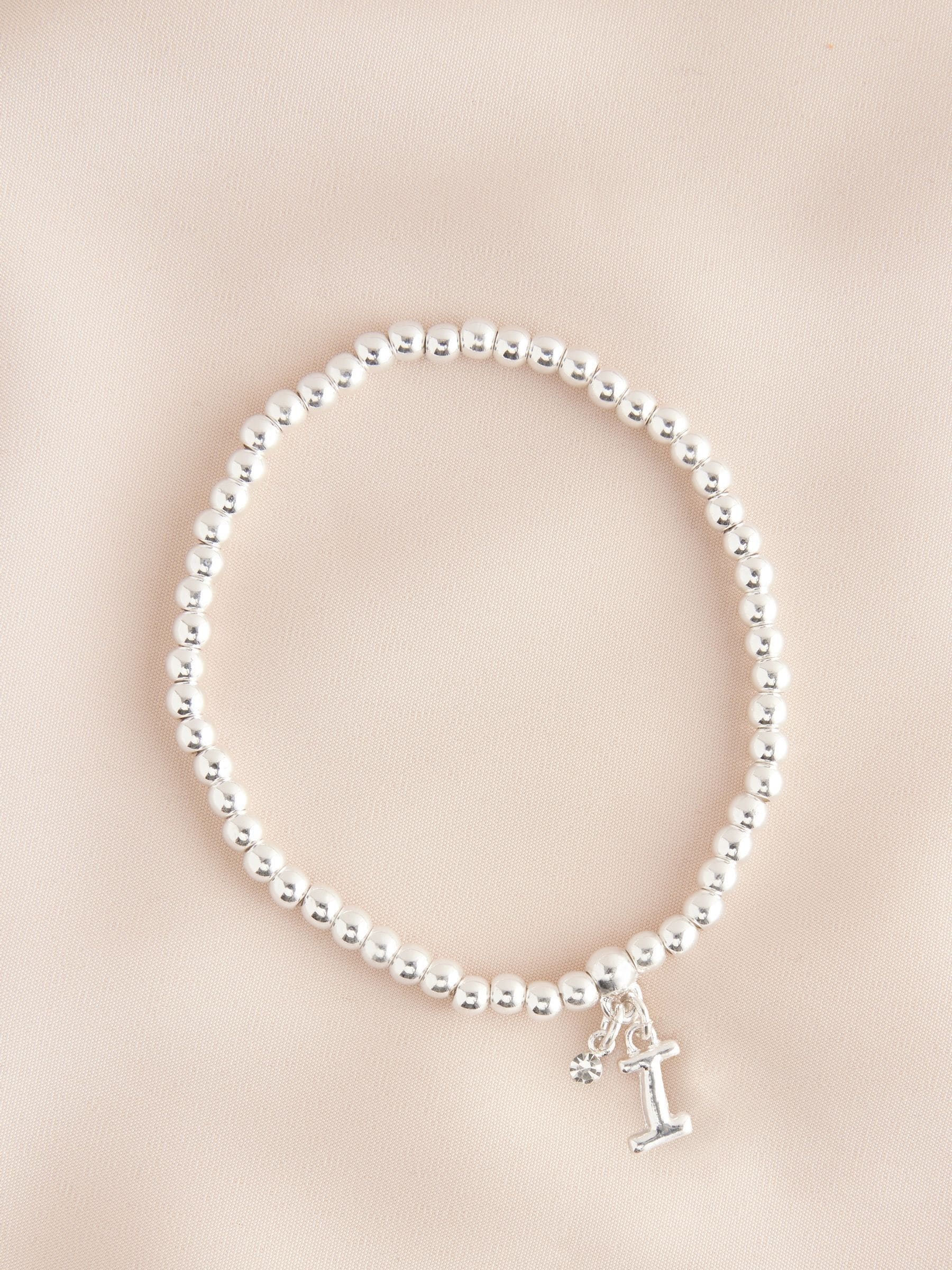 Zilverkleurig - Letterarmband met stretch