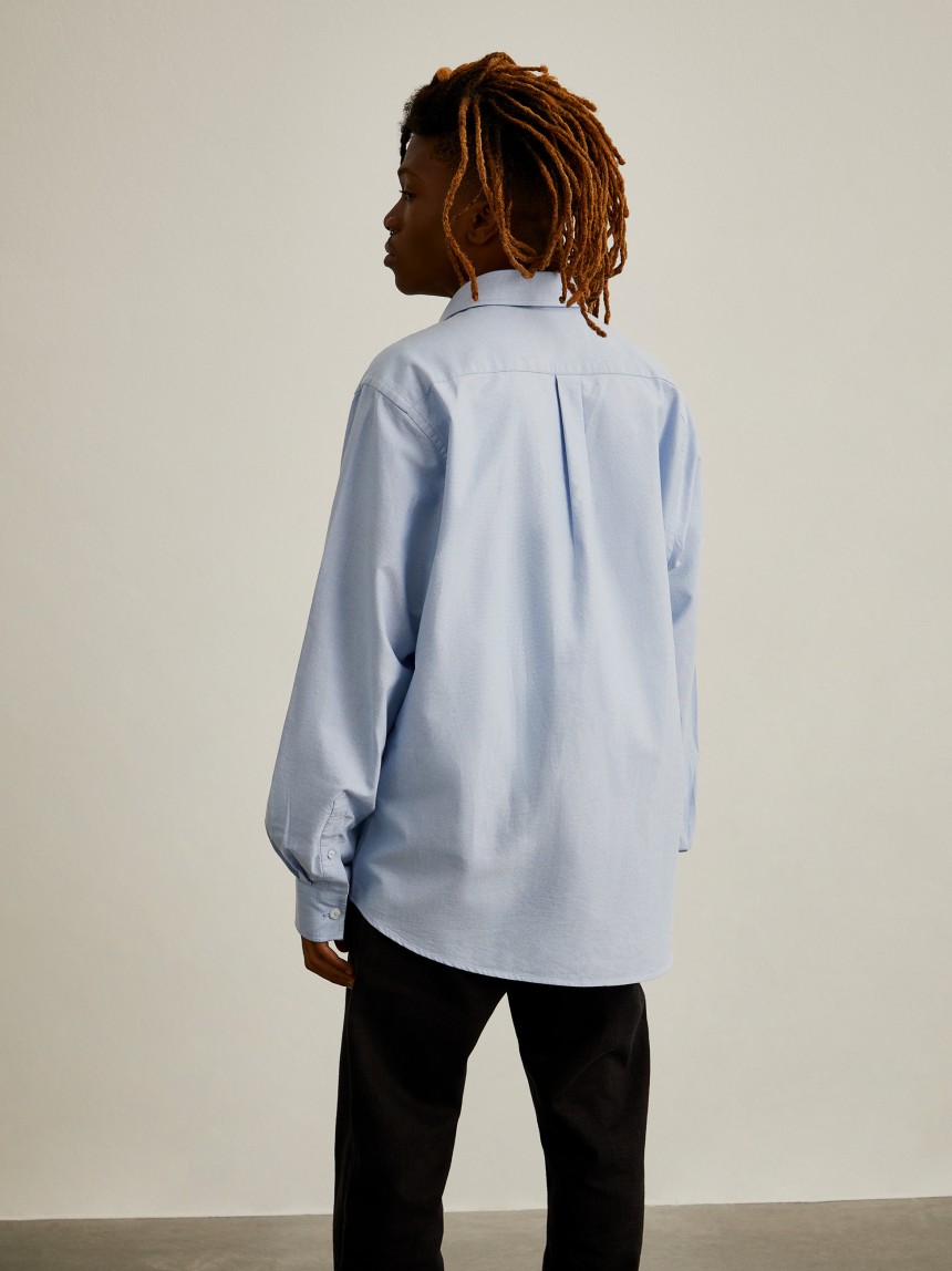 Camisa oxford com borboletas no bolso Lion x Killa