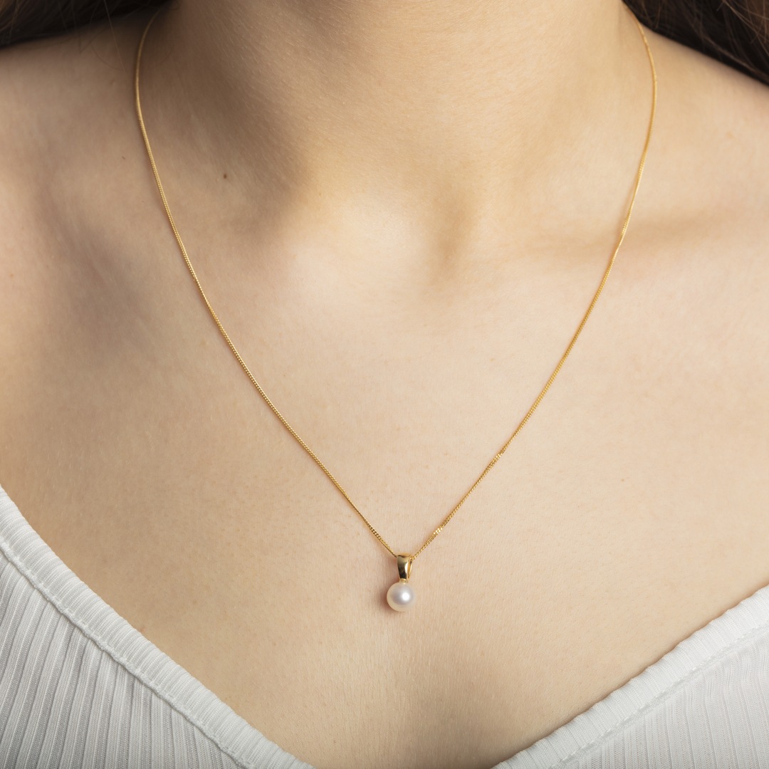 Anhänger 750/18 K Gelbgold mit Süsswasser-Kulturperle Ø 7.0mm