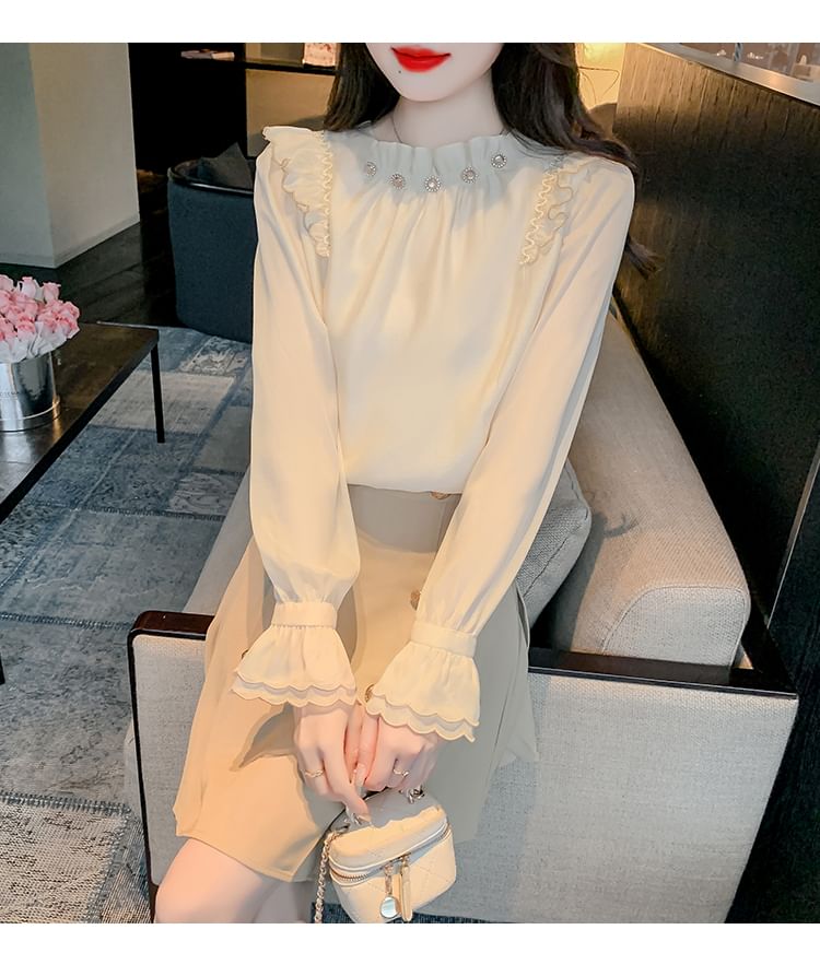 Dragan Pulse - Blouse met pofmouwen en hoge hals, effen, geplooid en strass steentjes