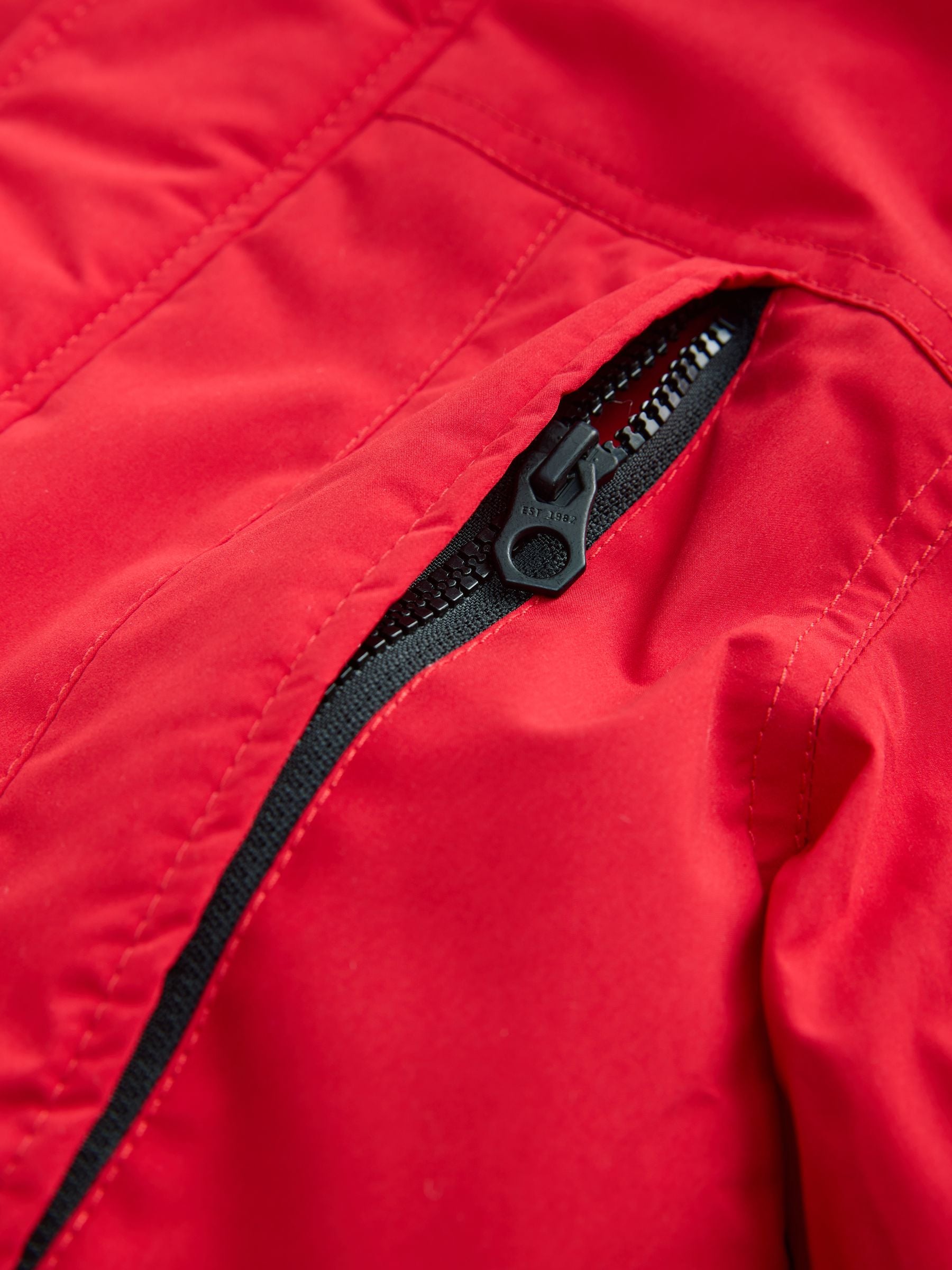Rood - Zware regenbestendige parka met imitatiebontrand (3-16jr)