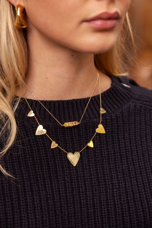 Minimalistische ketting met grote & kleine hartjes