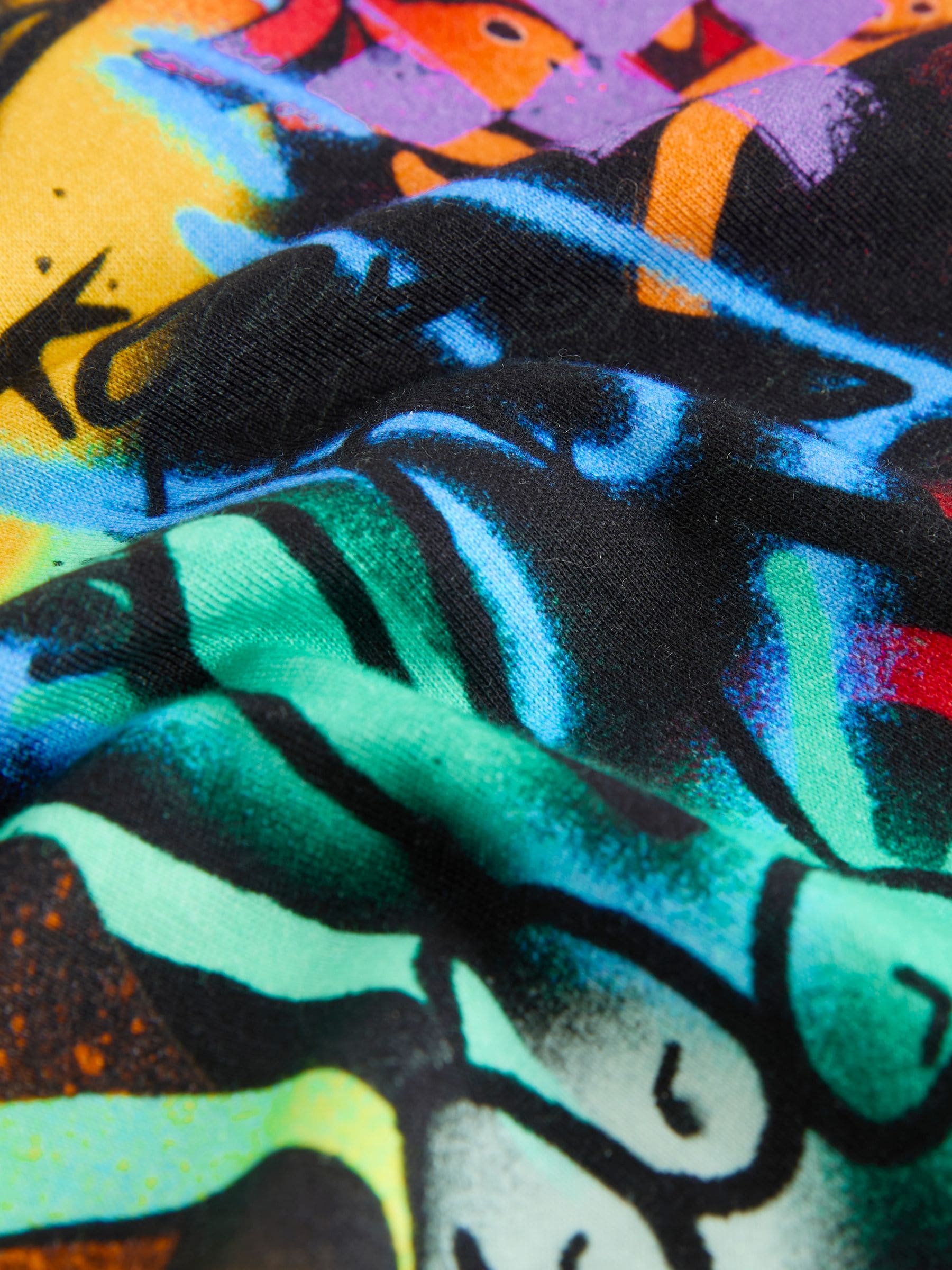 Zwart/Meerkleurig graffiti - Ruimvallend T-shirt met print en korte mouwen (3-16 jr)