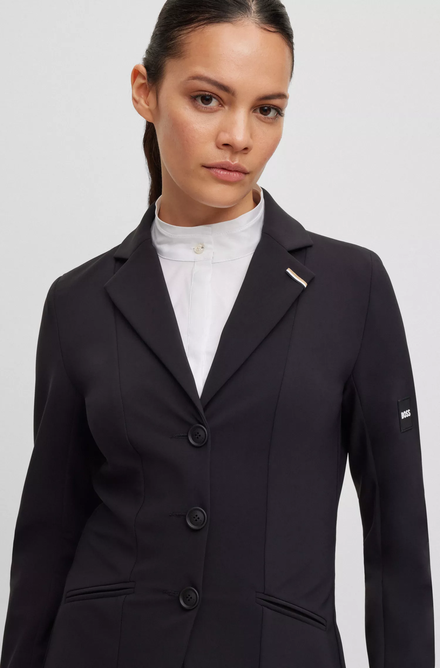 Jaqueta de competição BOSS Black-Equestrian slim-fit em tecido power stretch.