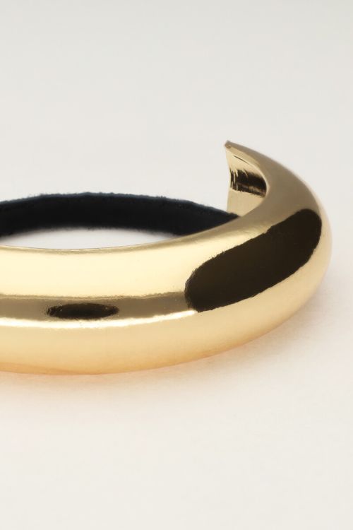 Haarelastiek met goudkleurige curve