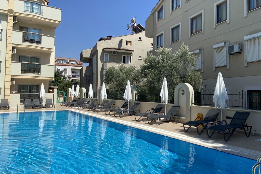 Club Karakas Logies - Appartement