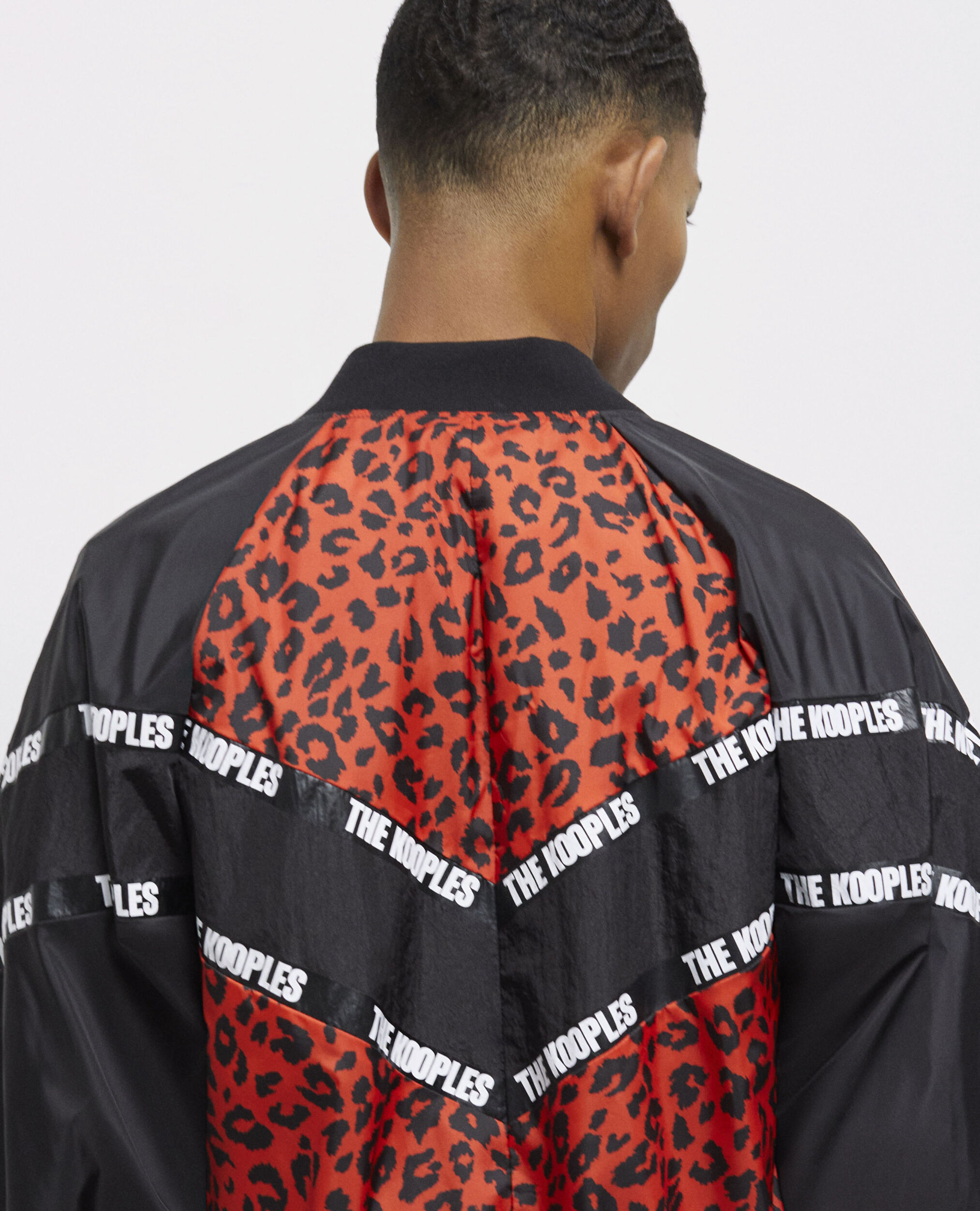Blouson bicolore avec bandes logo