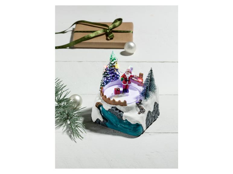Kerstdorp figuur met verlichting