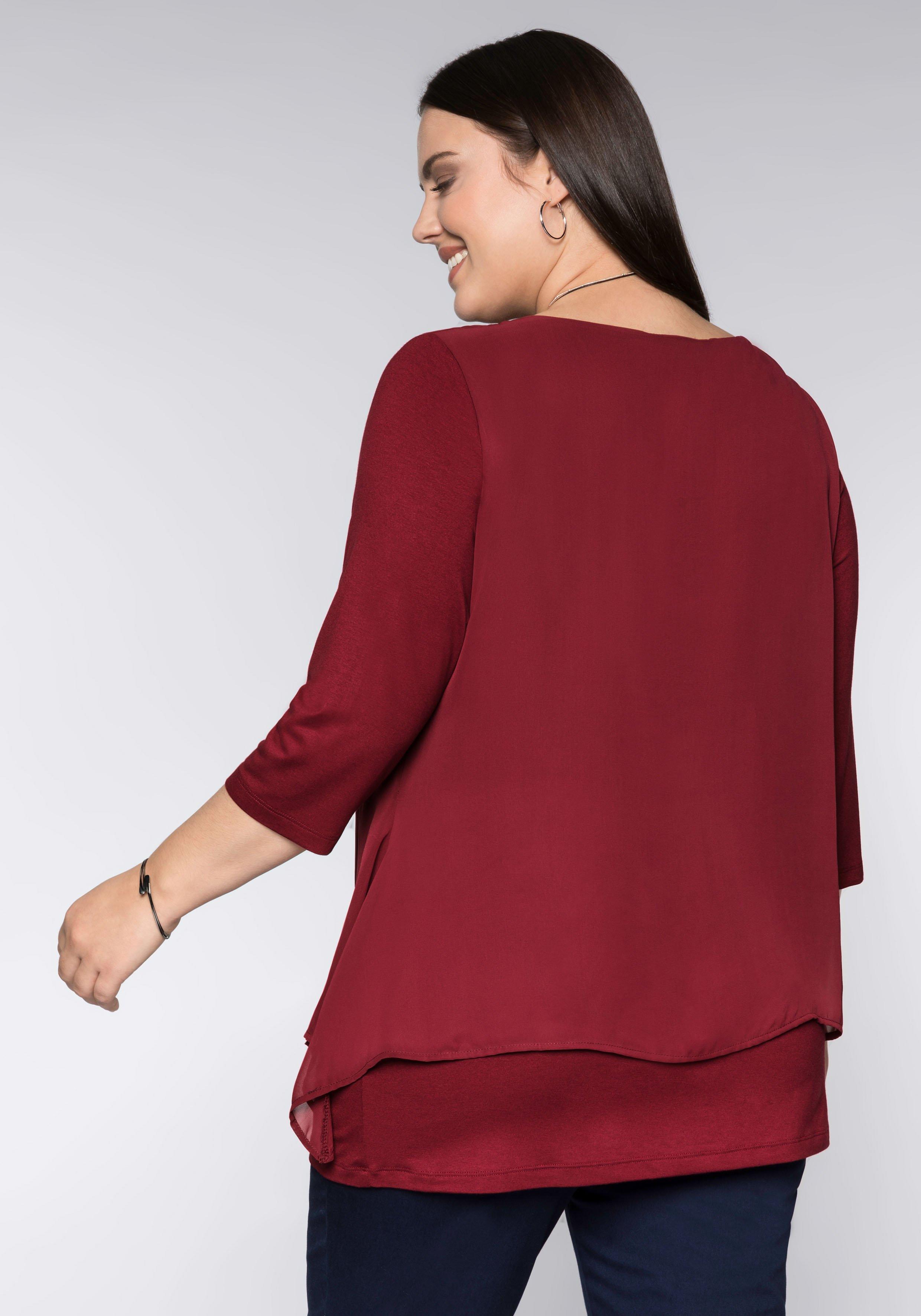 Blusenshirt in leichter A-Linie mit Zipfelsaum