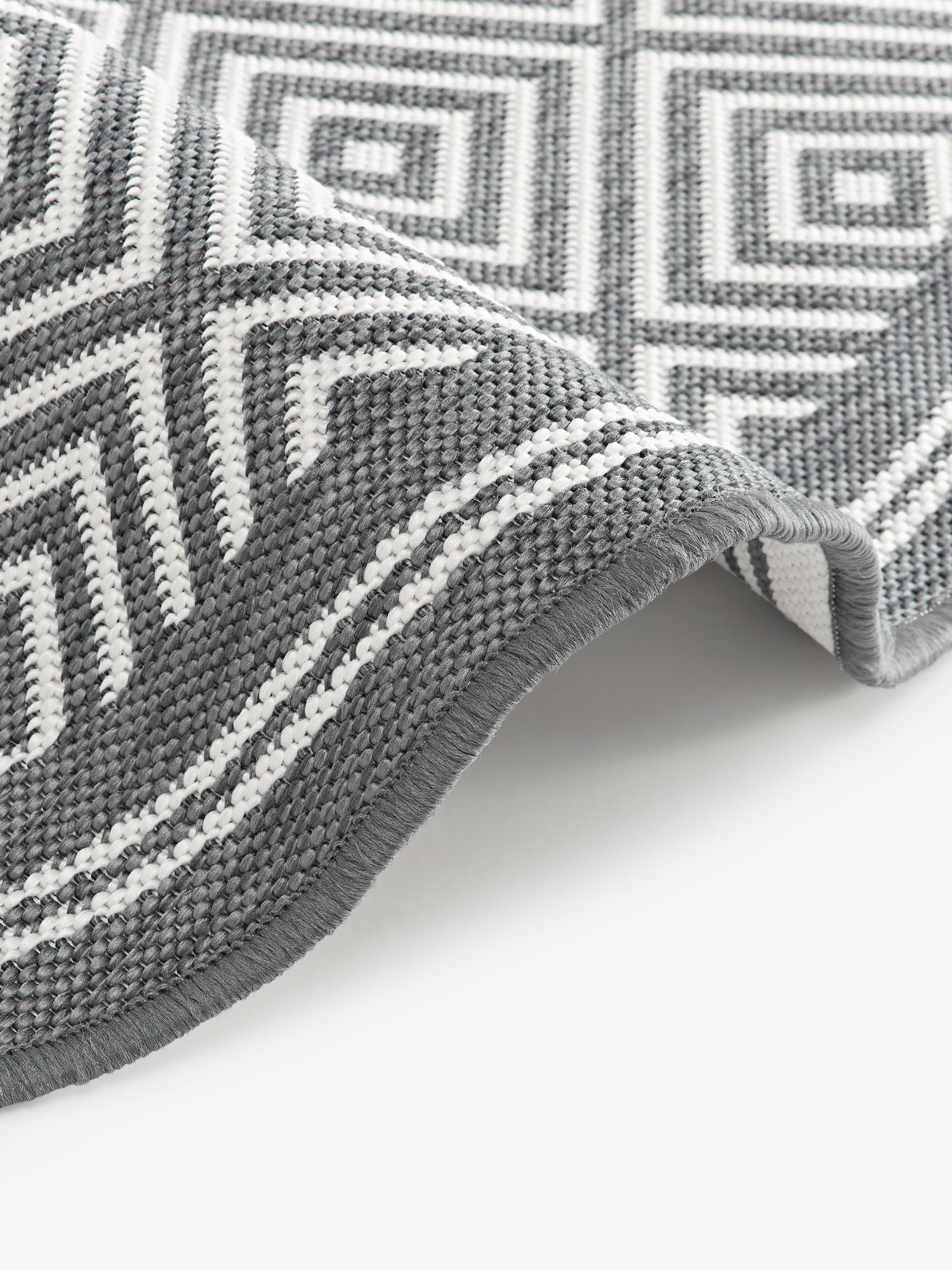 Ronde outdoor dubbelzijdig vloerkleed Reddy met ruitjesmotief