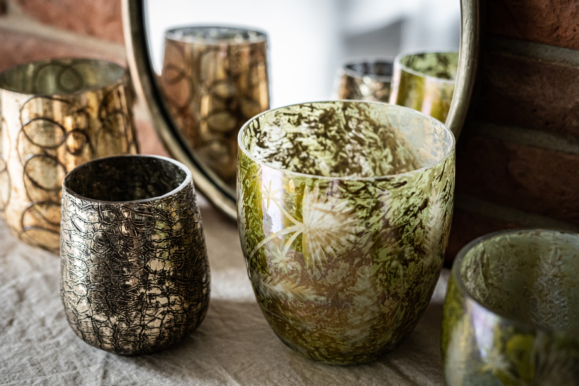 Glas-Windlicht 'Serpent', gold, Ø 11 cm, H 15 cm von fischer's lagerhaus