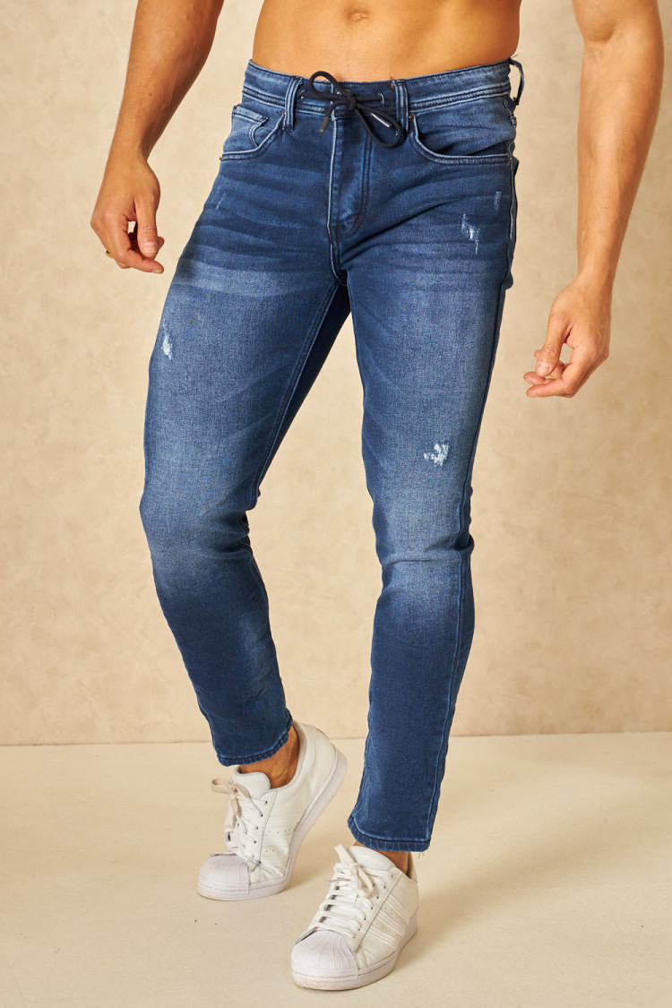 Jeans slim bleu déchiré avec élastique à la taille