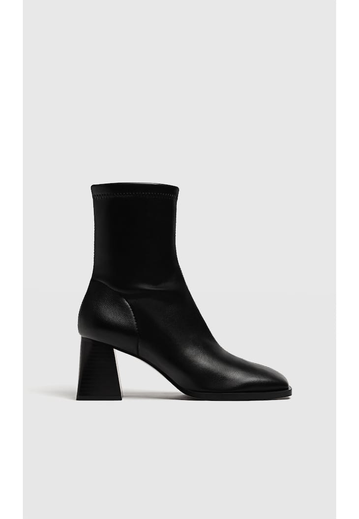 Botas de salto médio com pernas elásticas