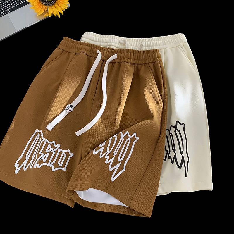 Kimeya - Sweatshorts met trekkoord en letterprint