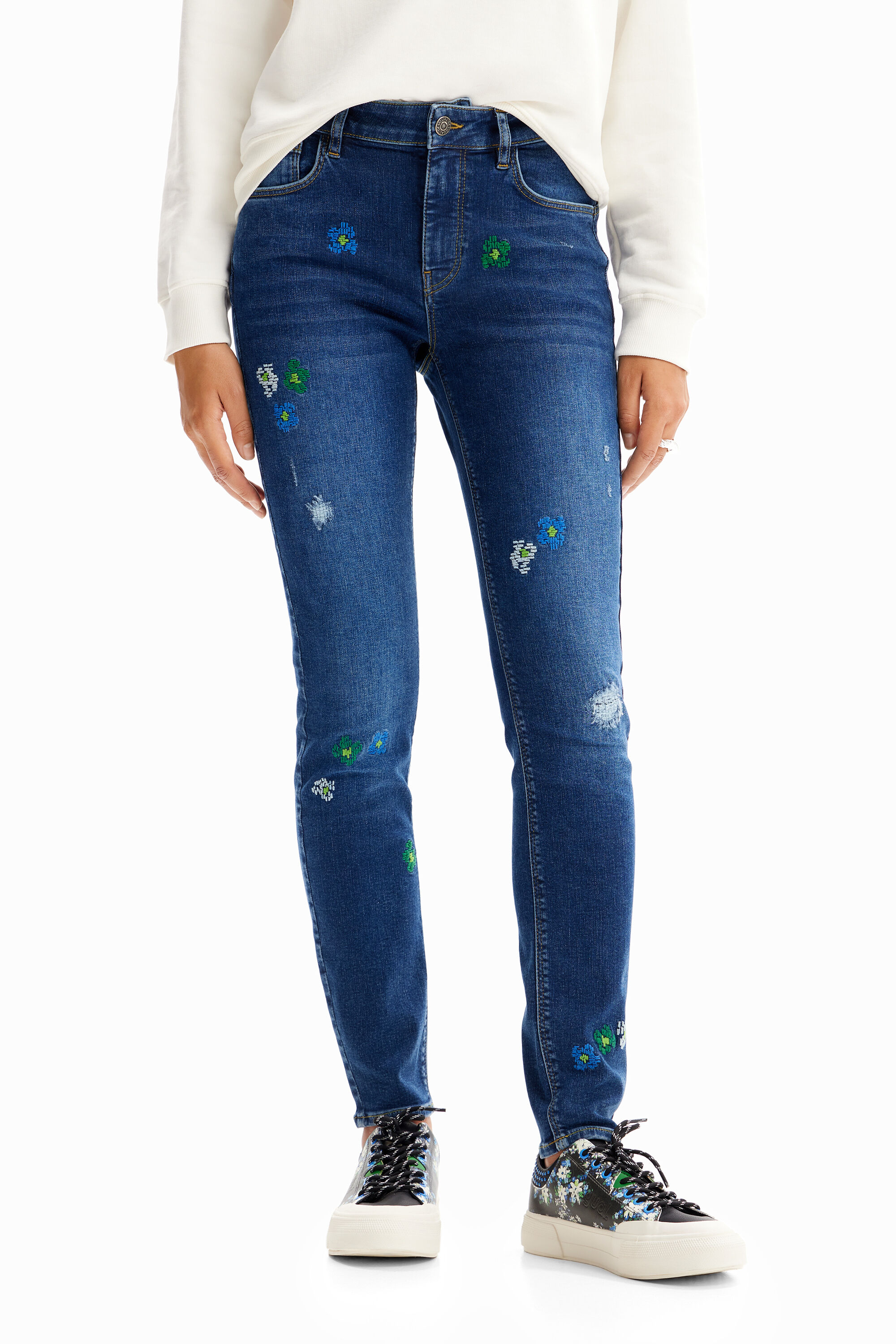 Calça jeans skinny push-up bordada