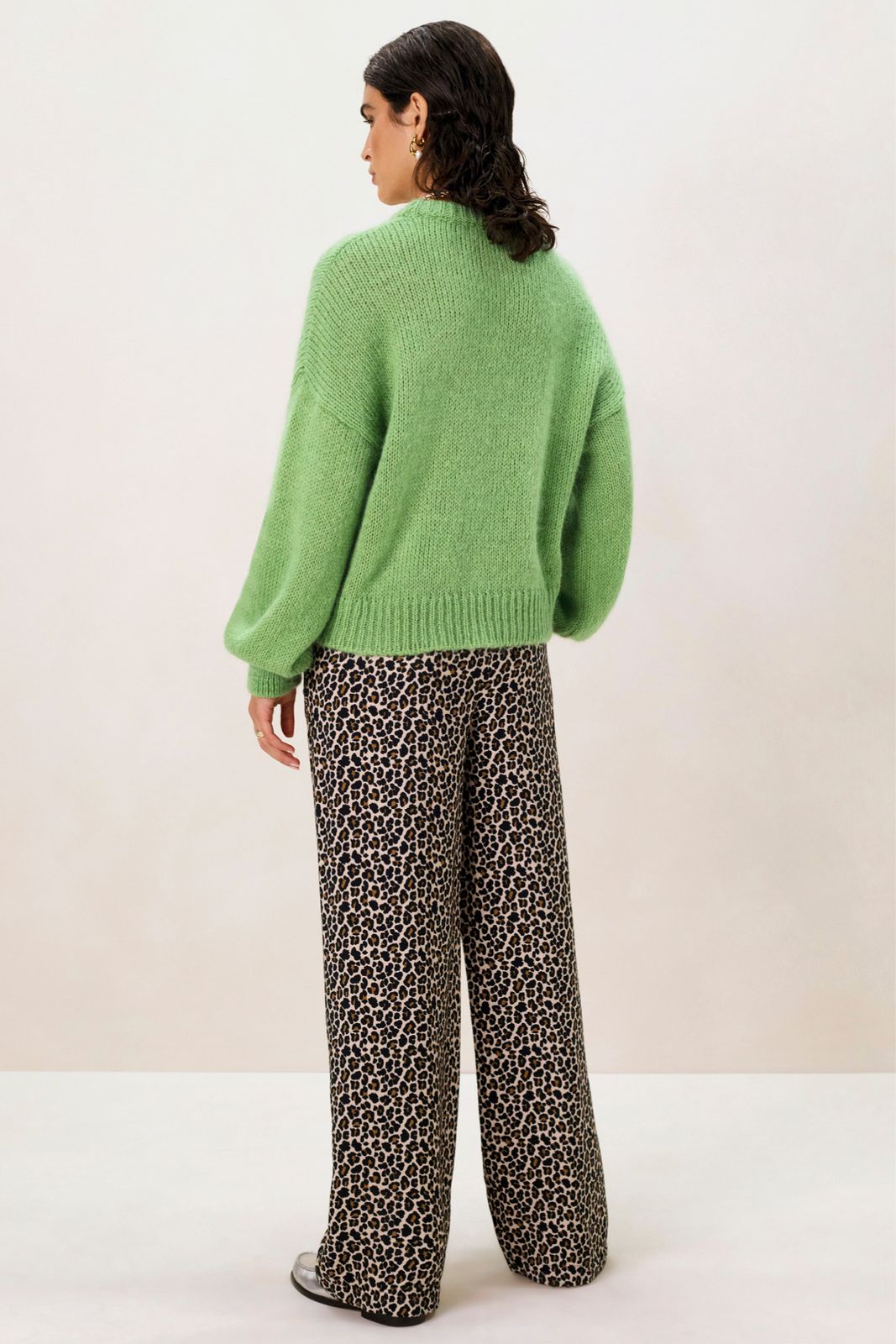 Groene gebreide trui met hart