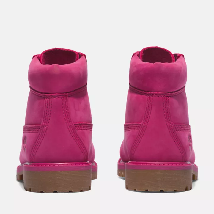 Bota Timberland Premium de 6 polegadas impermeável, edição especial 50, para crianças, na cor rosa escuro.