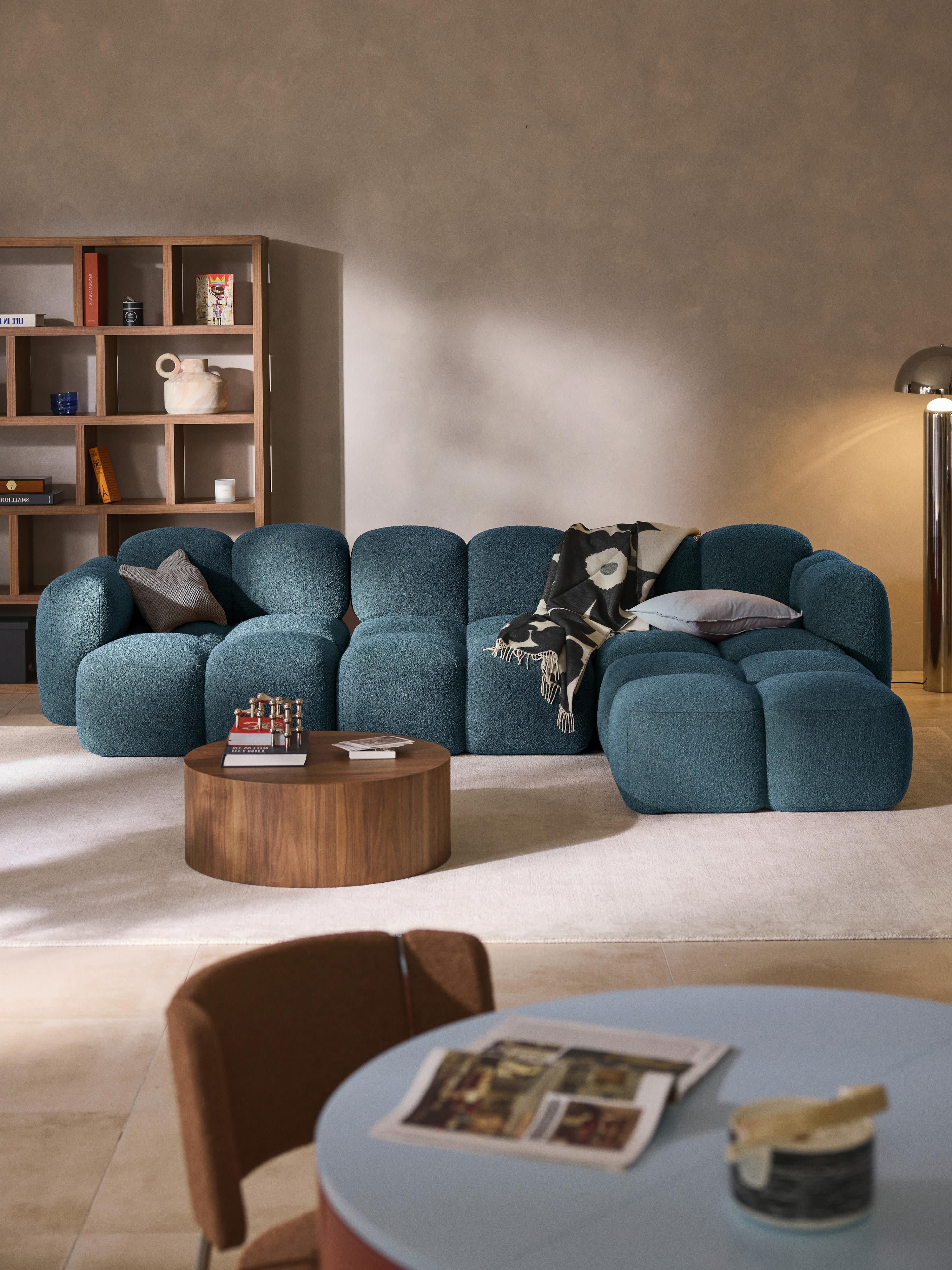 Modulaire bank Tayla (4-zits) van bouclé met poef (links/rechts)