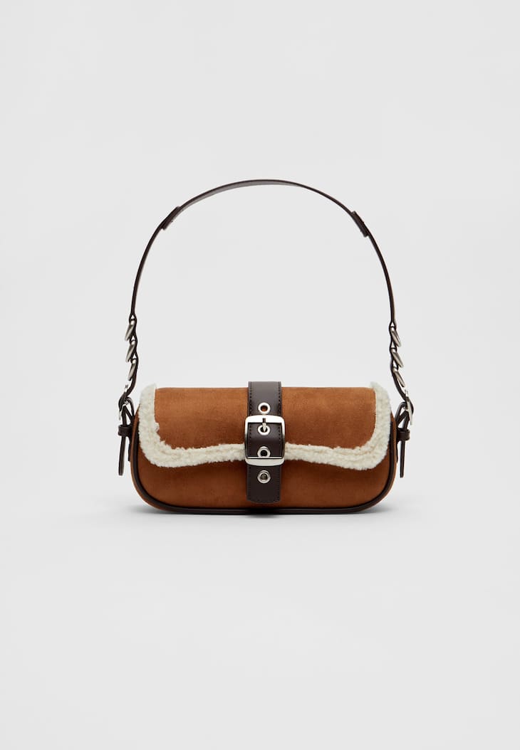 Bolsa de ombro com fivelas