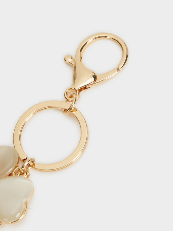 Chaveiro de resina dourada com flor - Dourado