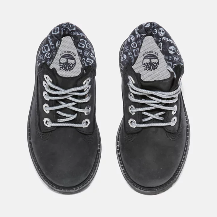 Bota infantil premium impermeável de 15 cm na cor preta.