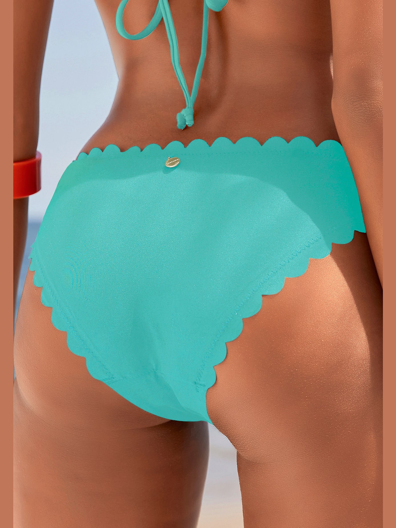 Bas de maillot de bain bords ondulés au laser