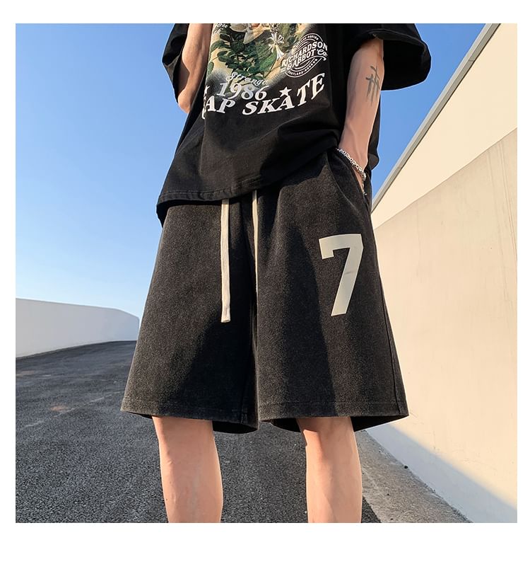 Kimeya - Gewassen sweatshorts met trekkoord en nummerprint