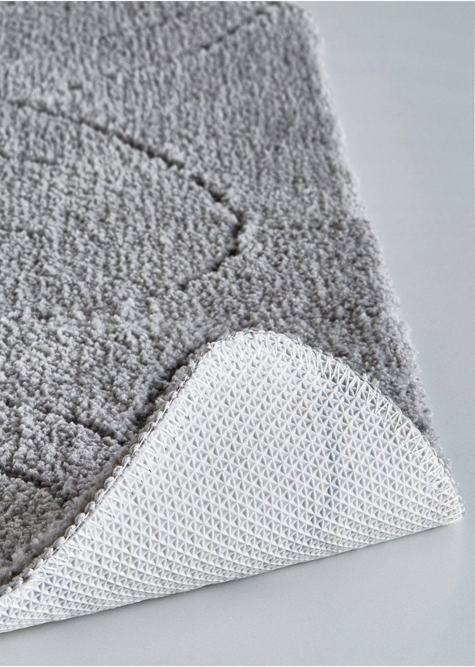 Tapis de salle de bain tufté avec motif en relief