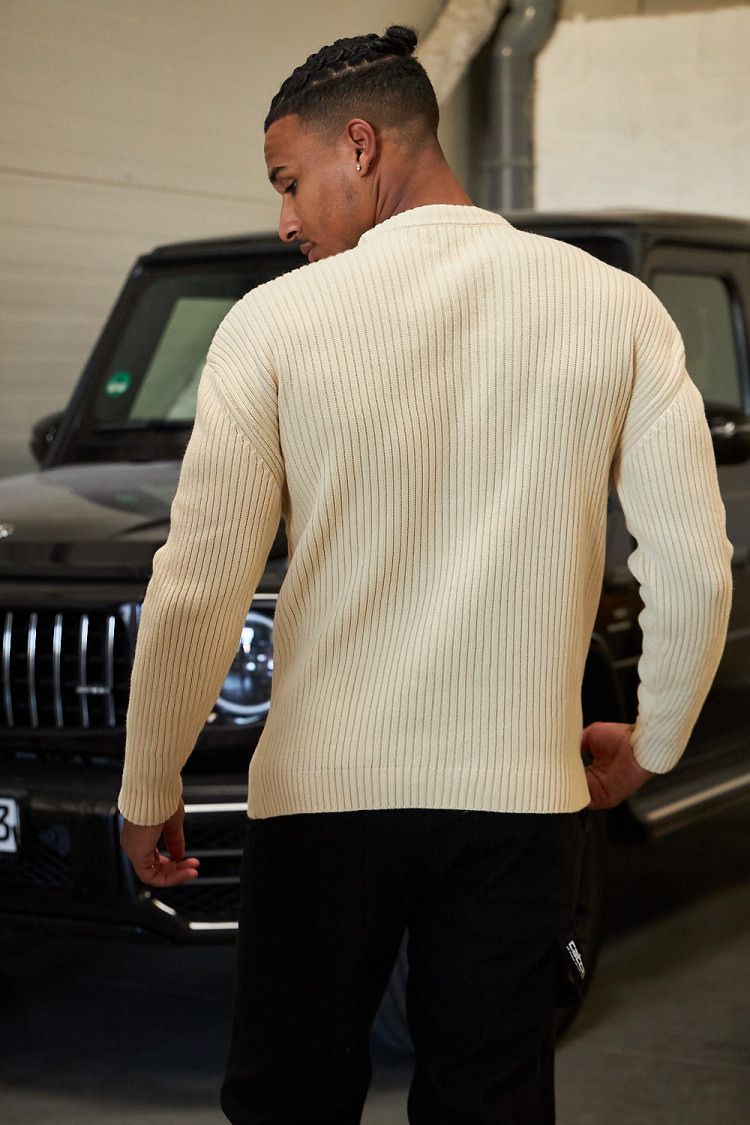 Pull beige en maille à col rond