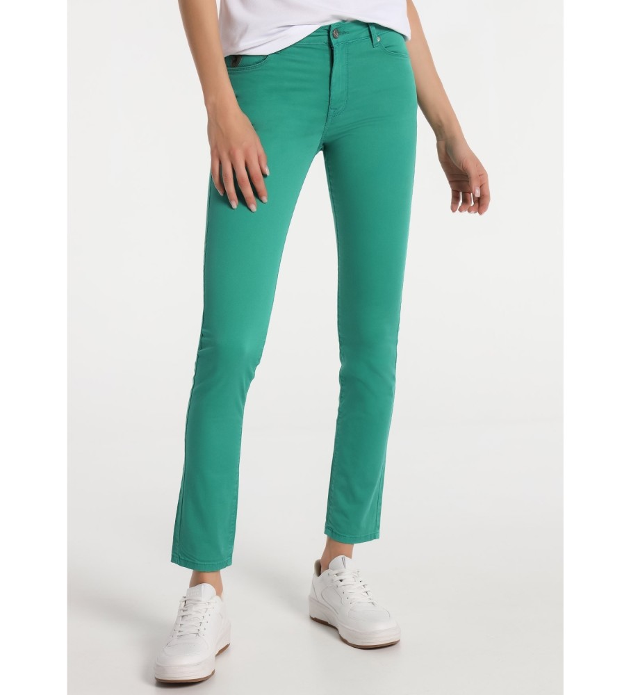 Calça Lois em sarja, cintura alta, corte skinny, verde.