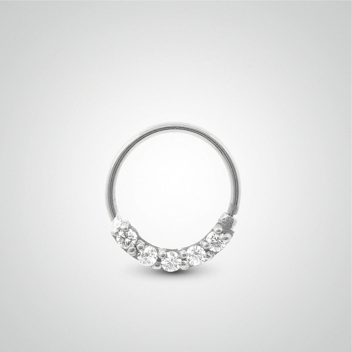 Piercing de tragus anneau or blanc à écarter avec trèfle zircon