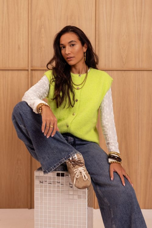 Limegroen gilet met fancy knopen
