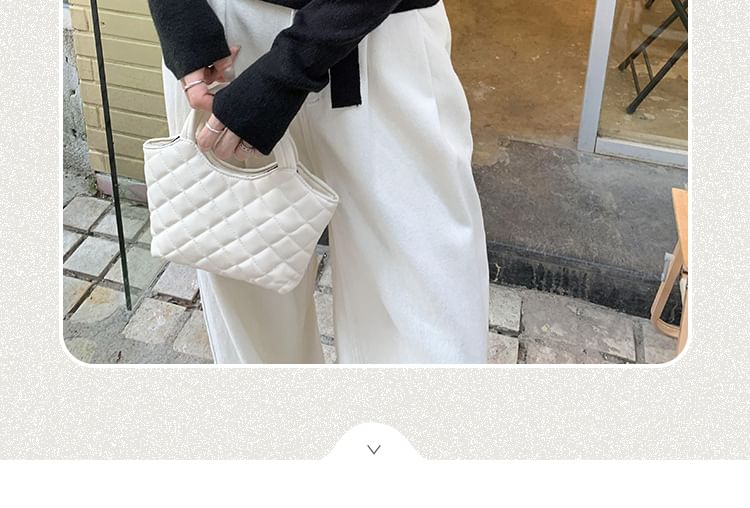 Joyciful - Asymmetrische, effen gebreide top met lange mouwen en off-shouldermotief
