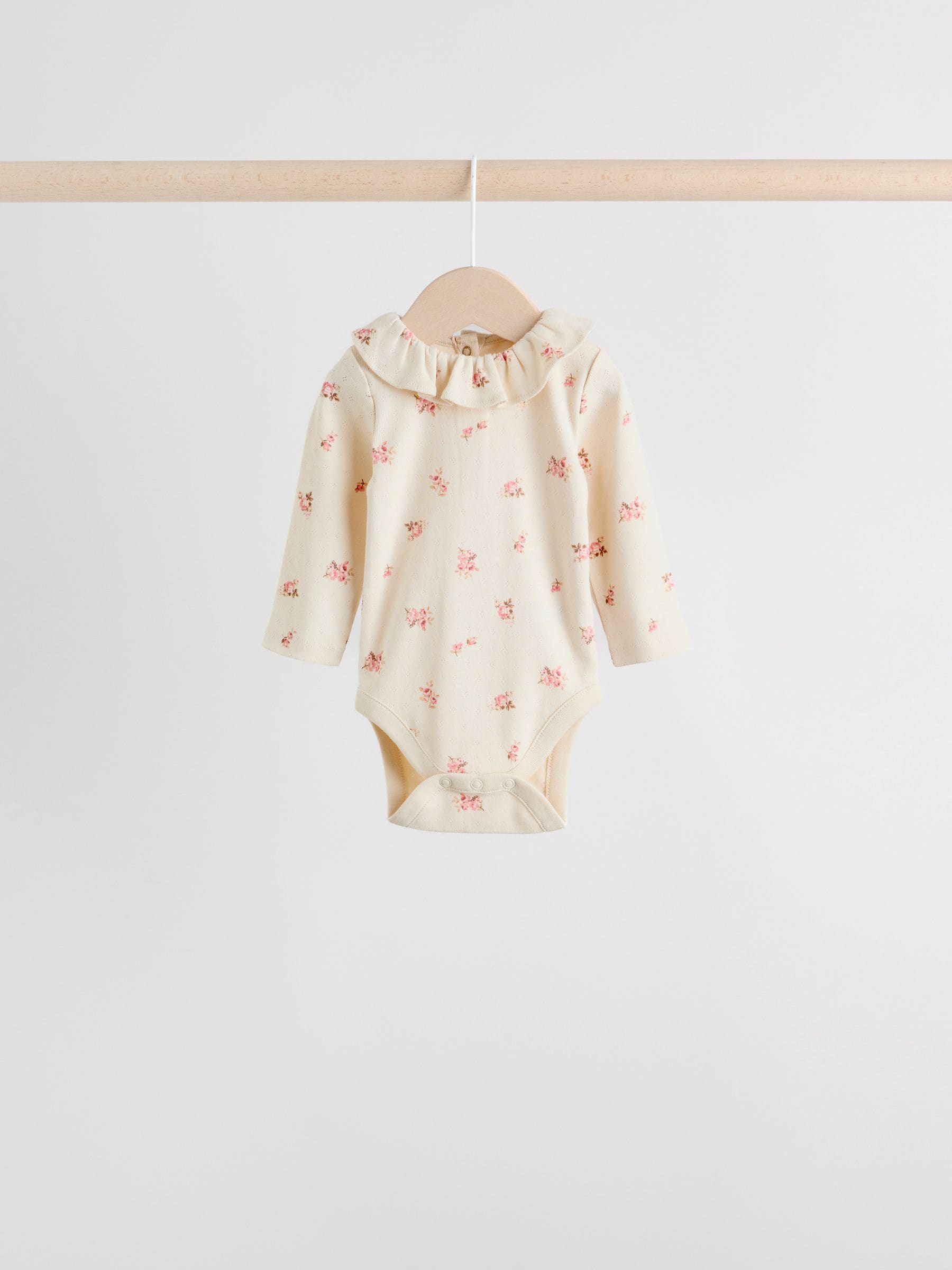 Roze/crème/bruin met fijne bloemetjesprint - Verpakking van 4 babyrompers met lange mouwen en ruches (0mnd-2jr)