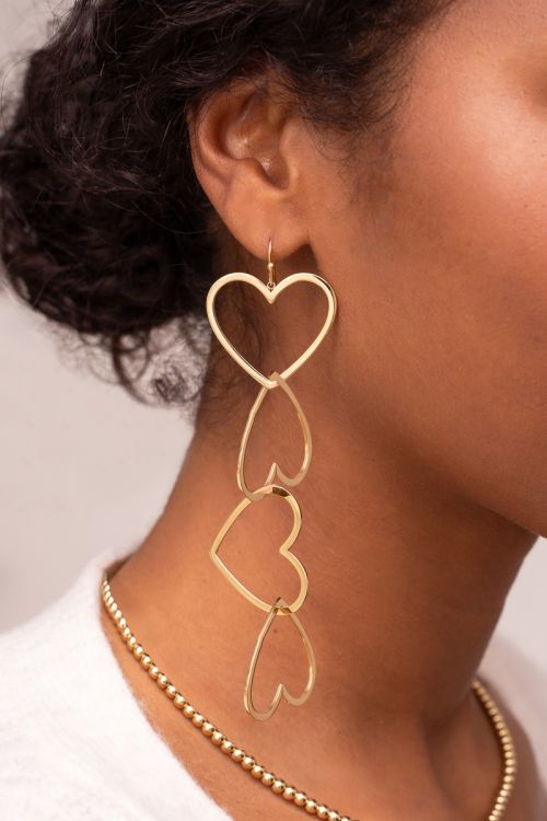 Statement oorhangers met open hartjes