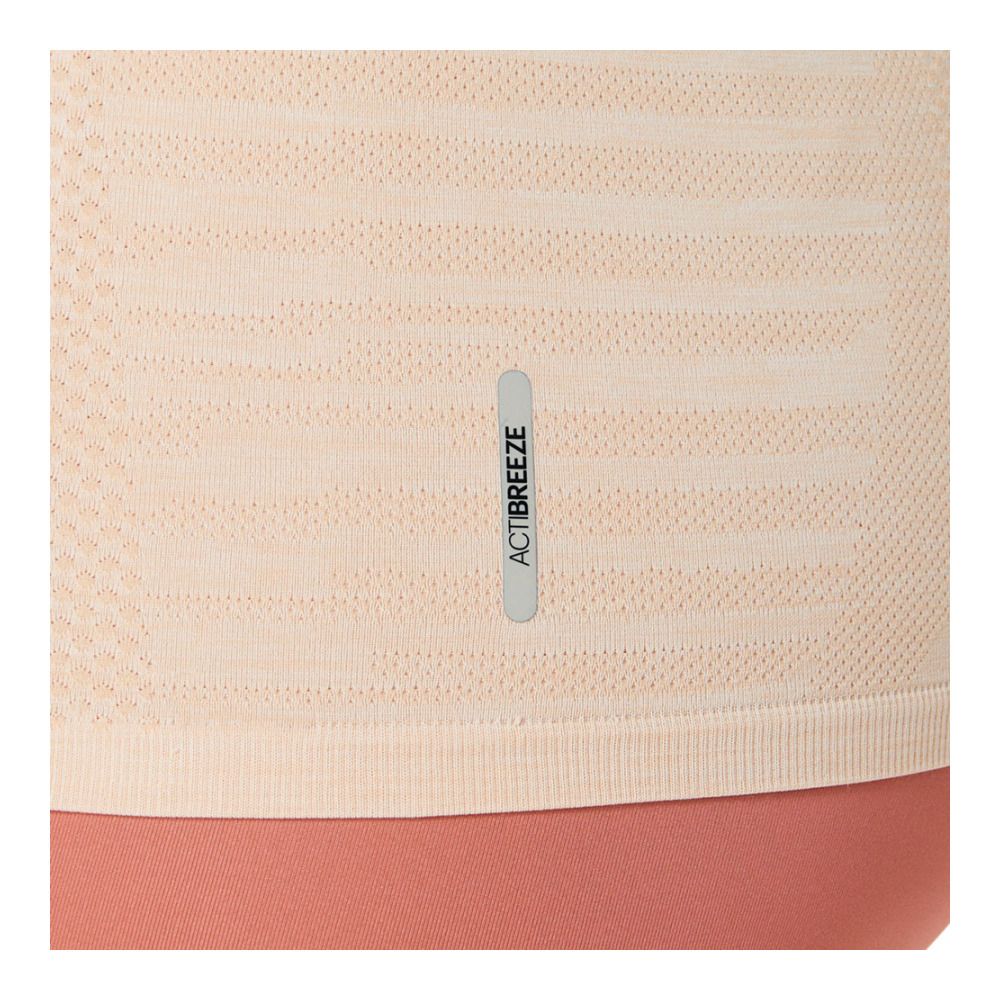 Asics SEAMLESS - Tee-shirt Femme pale apricot/light garnet