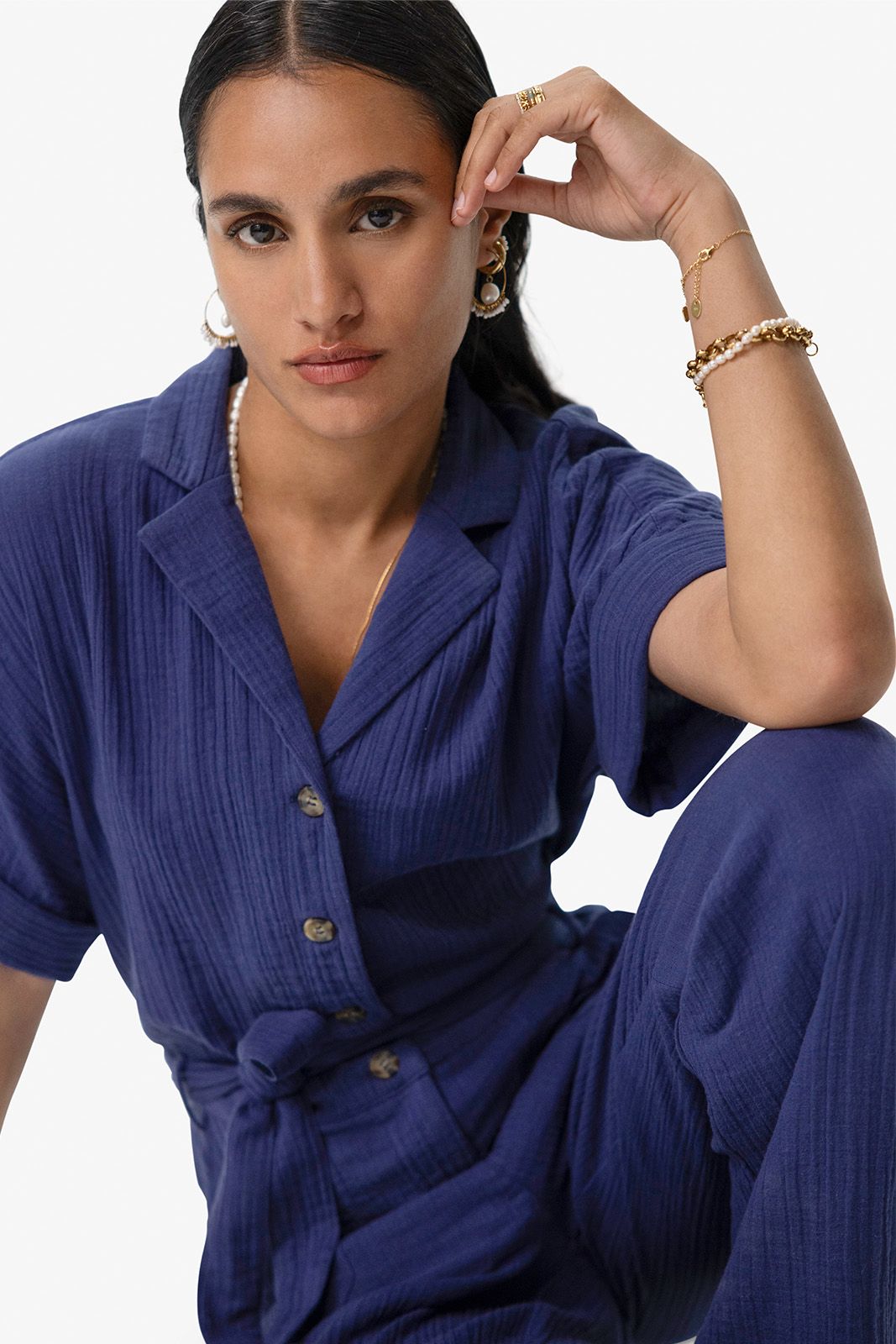 Blauwe jumpsuit met reverskraag