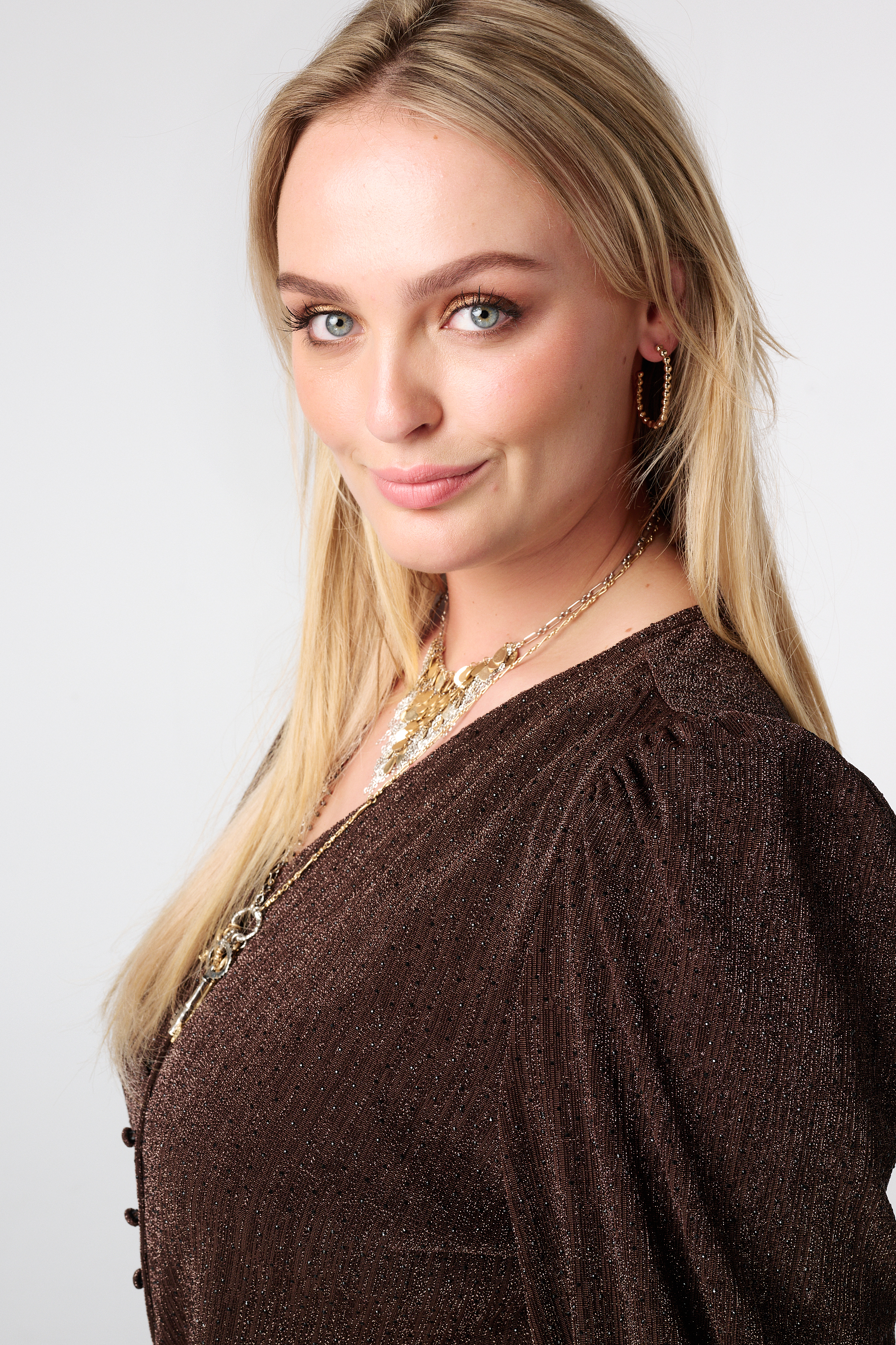 Glitter jumpsuit met ceintuur bronze