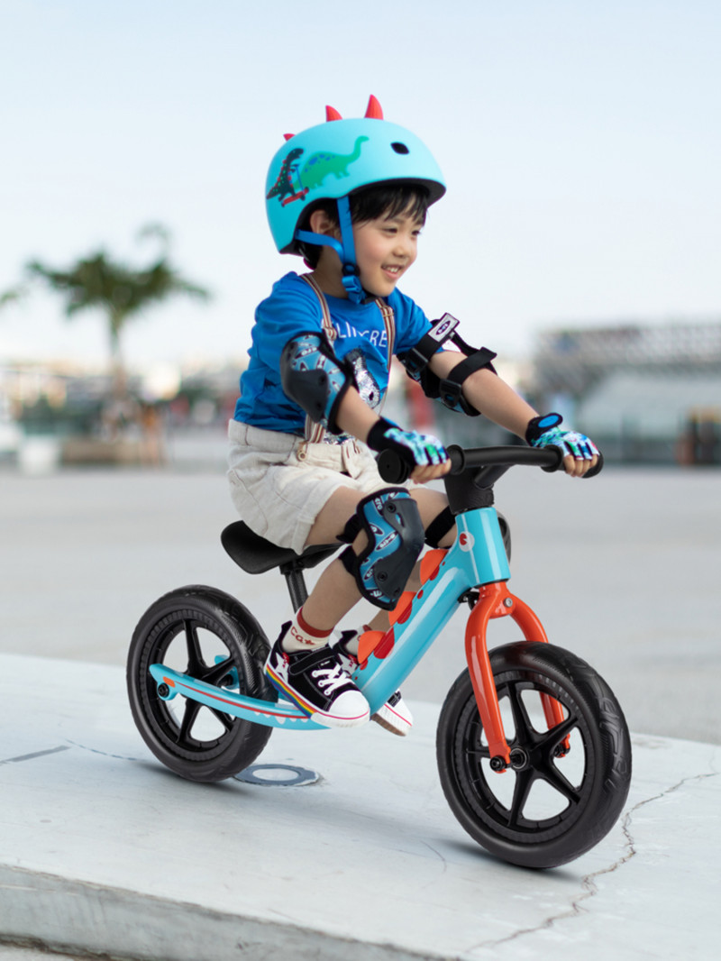 Draisienne balance dino 3d bleu nuit et orange - cadre magnesium et roues evadraisi