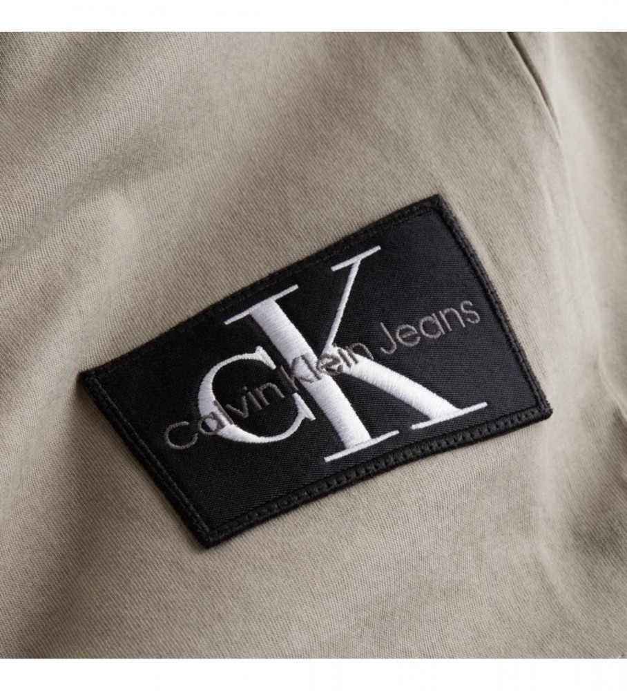 Camiseta de algodão Calvin Klein Jeans com emblema cinza