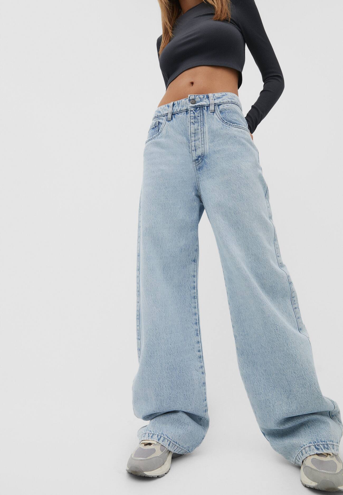 calças jeans de perna larga
