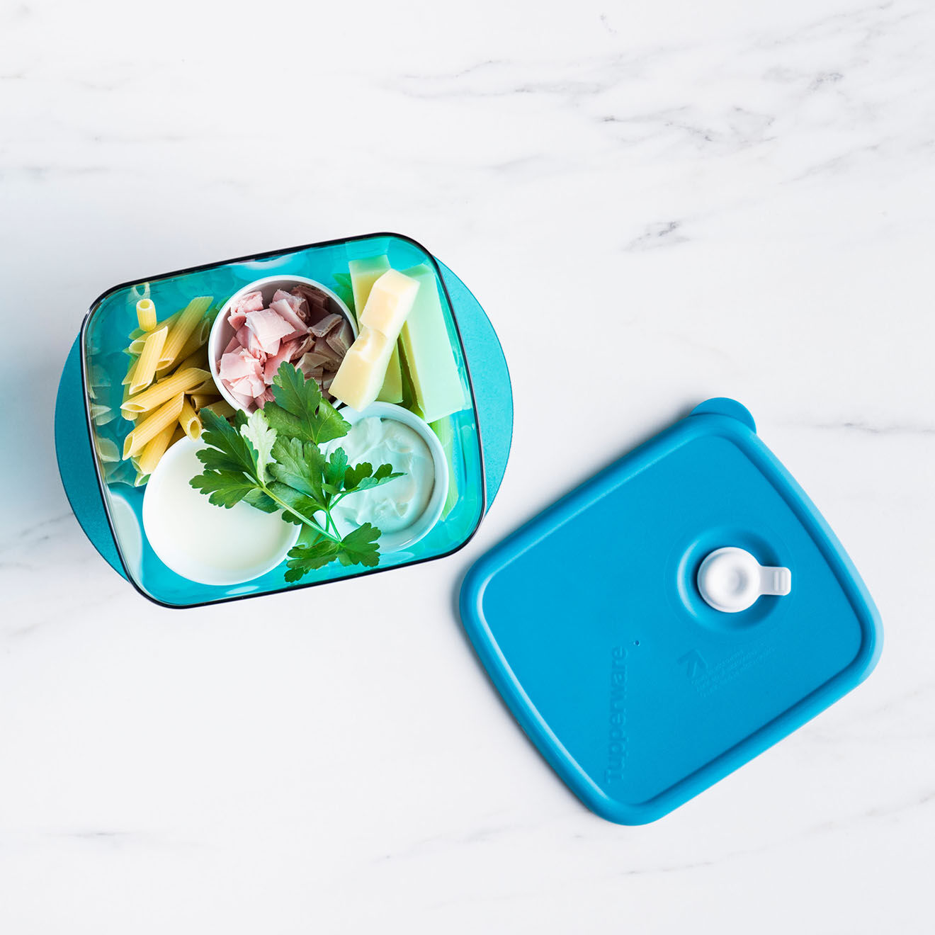 Tupperware Boite avec couvercle Crystal Up bleu glacial - 600ml
