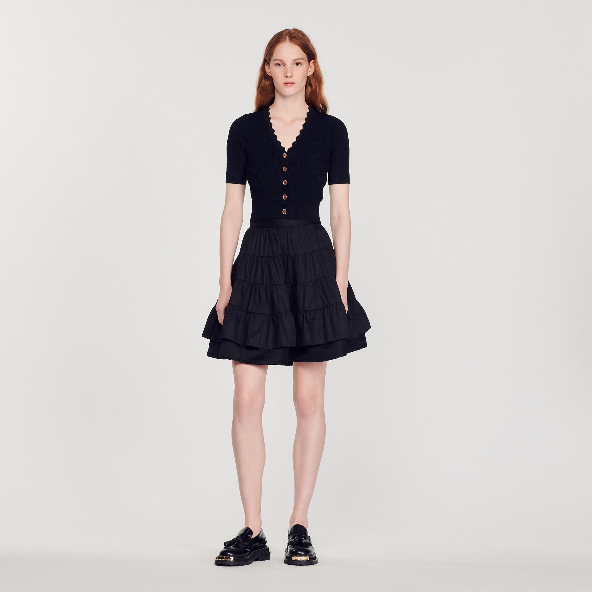 Pull en maille et boutons fantaisie