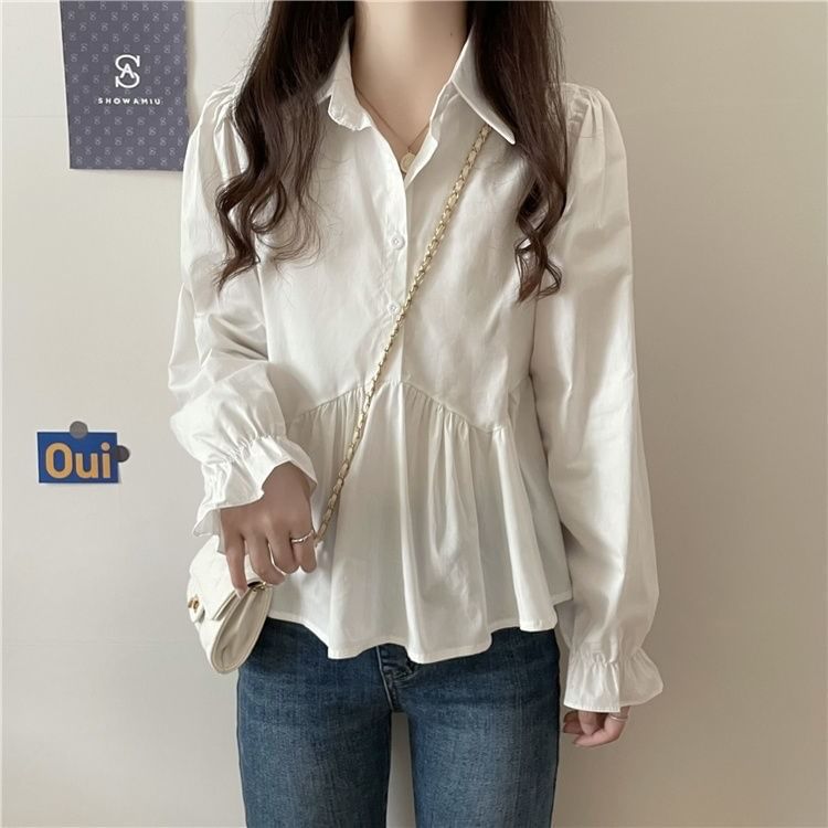 Sisyphi - Blouse met pofmouwen en knoopjes