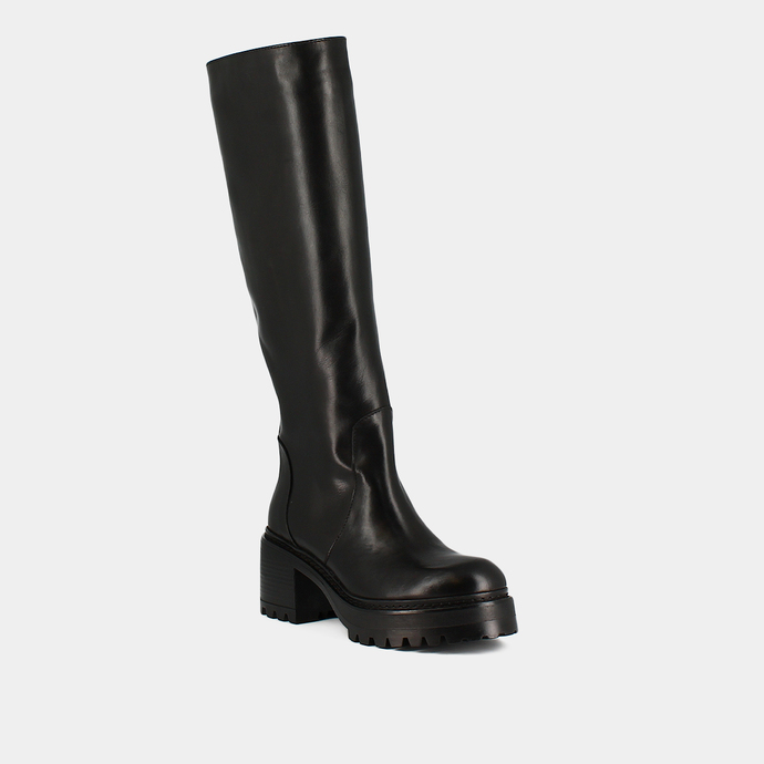 Bottes à bouts ronds et semelles crantée...  en cuir noir