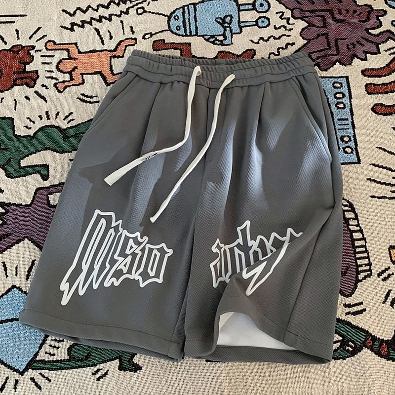 Kimeya - Sweatshorts met trekkoord en letterprint